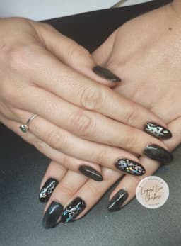 Clear BIAB, with black gel and cracked foil nail set.