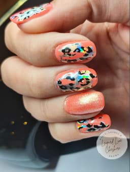 Neon orange with cracked leopard print foil, plus glitter