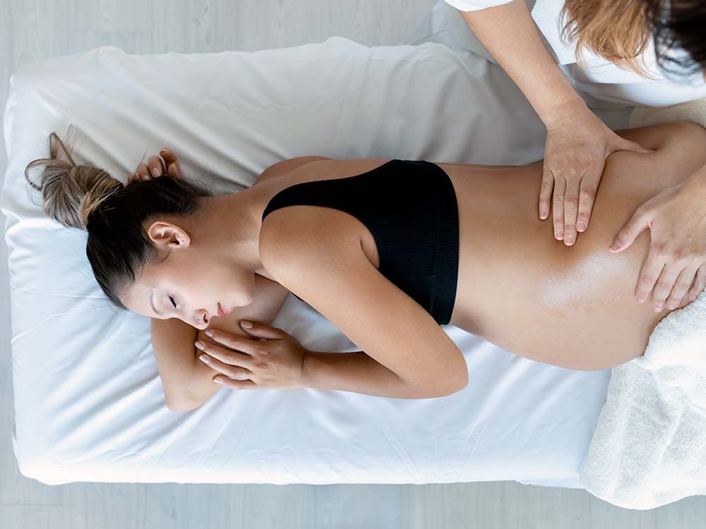 Soothing pregnancy massage in Hemel Hempstead, tailored for expectant mothers to ease back pain, reduce swelling, and promote relaxation in a safe, supportive environment.