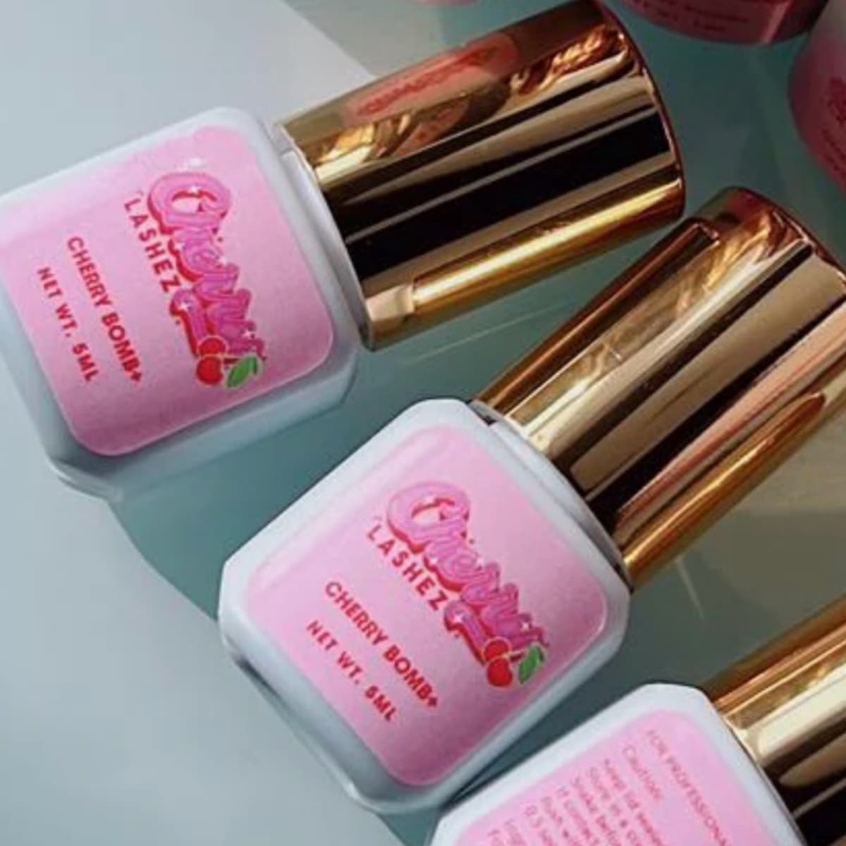 **Cherry Bomb+Lash Glue**
My absolute go to! The Cherry Bomb 0.03sec glue is  easy to work with retention is amazing every time!