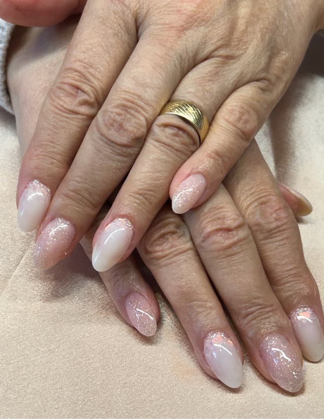 Milky pink glitter nails