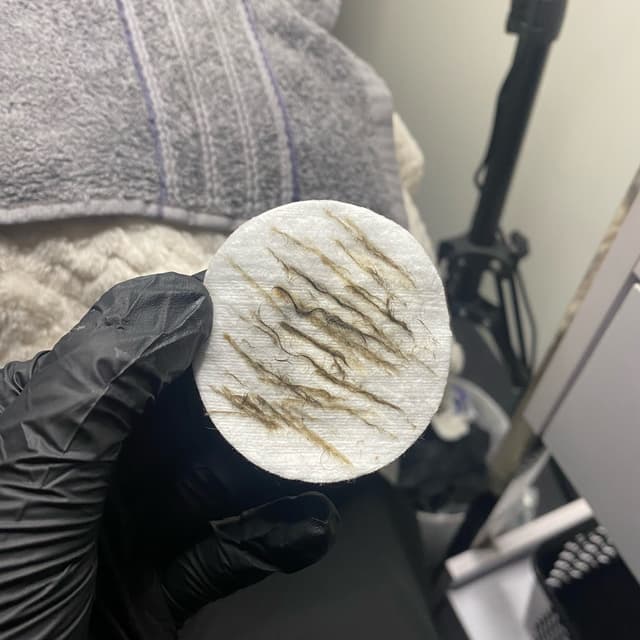 Dermaplaning removal pad