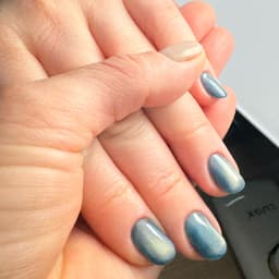 Prescriptive manicure + cat-eyes