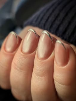 Natural nude nails with elegant silver chrome French tips – a timeless manicure created at MissbehaveNails in Leighton Buzzard.