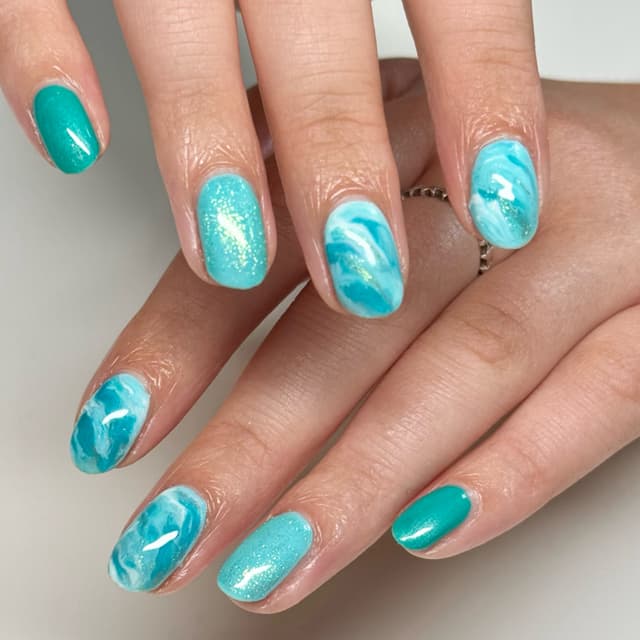 Gel polish manicure with marble design