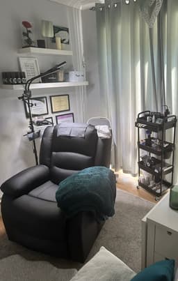 Eden Eyes lash lounge. You’ll lay in a comfortable recliner chair vs a flat massage bed that has heat and massage settings. You can choose from a variety of sensory settings to make your appointment calming and efficient.