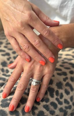 Bright orange manicure at Polished by Louise, your trusted nail salon in Great Dunmow.