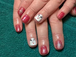 The first Christmas set of 2024. Snowflakes on index finger, reindeer on ring finger and present on thumb.