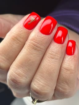 christmas red over a builder gel base with a hand painted chrome decal