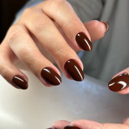 sleek dark brown nails over a builder gel base