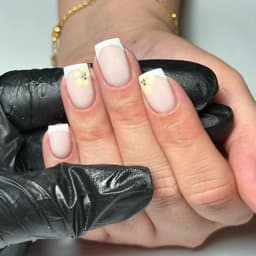Crisp French tips and nail art - Nail Salon in Leeds