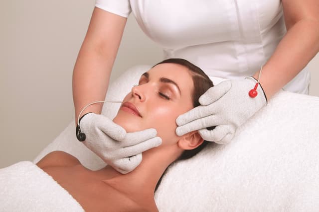 CACI Micro-Touch - facial toning using CACI's microcurrent Electro Gloves
