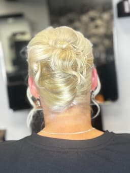 Sophisticated blonde updo hairstyle at Rhubarb Hair, Beauty & Barbers in Stockton-on-Tees – perfect for weddings, proms, and special occasions.