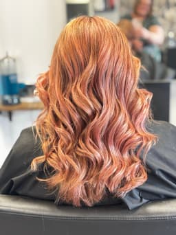 Rose gold balayage with soft curls created at Rhubarb Hair, Beauty & Barbers in Stockton-on-Tees – a vibrant, stylish look for any occasion.