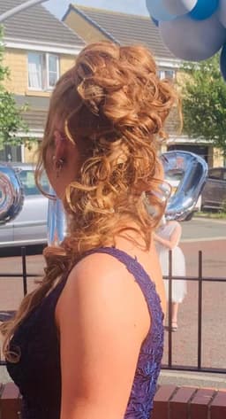 Elegant updo hairstyle created at Rhubarb Hair, Beauty & Barbers in Stockton-on-Tees – perfect for weddings, proms, and special occasions